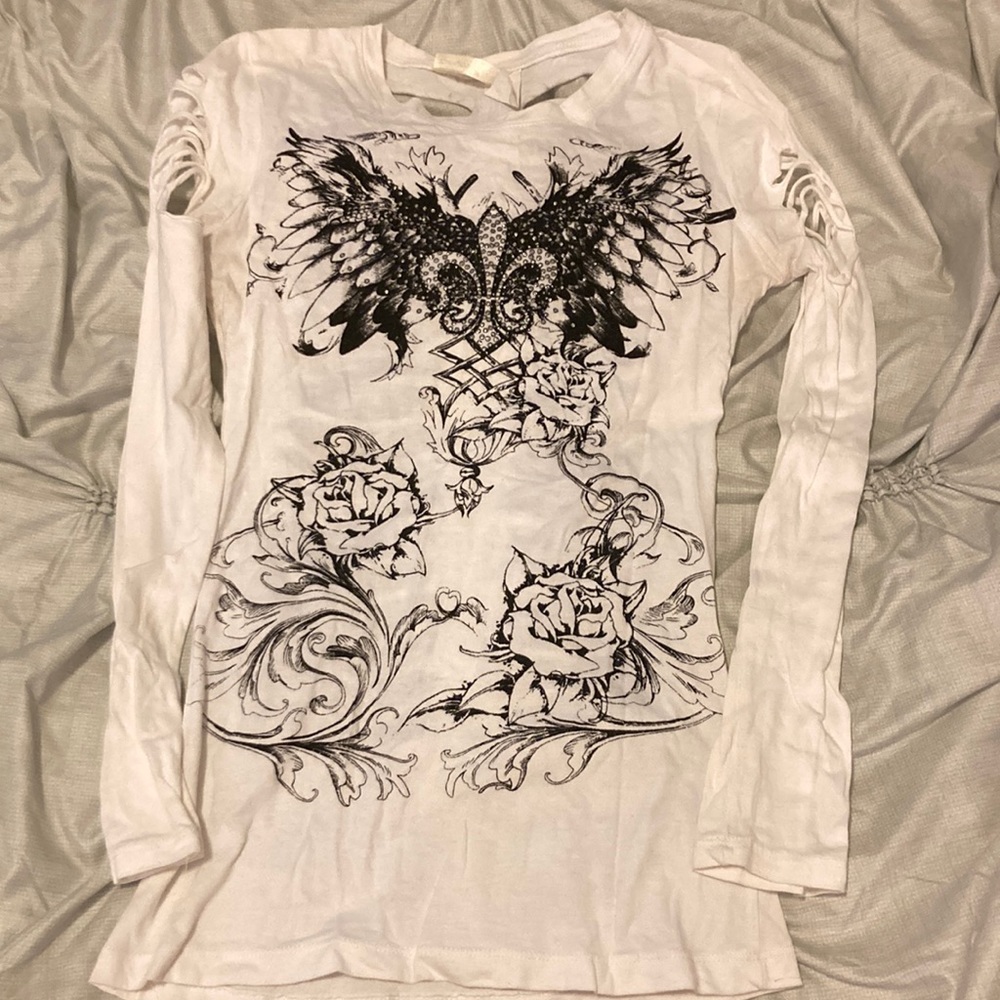 Long sleeve sexy ripped shirt.